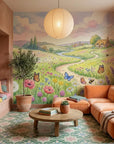 Dandelion Wishes mural wallpaper featuring pastoral countryside scene with wildflowers and butterflies in living room