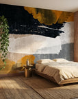 Dark Ember black and gold abstract wallpaper in a warm and inviting living room