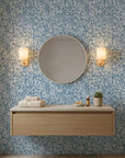 Deep Current coastal blue abstract wallpaper creating ambiance in a serene bathroom