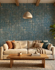 Deep Loom textured blue abstract wallpaper in a warm and inviting living room