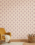 Desert Compass red geometric peel and stick wallpaper bringing warmth to a peaceful nursery
