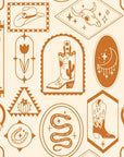 Warm clay-toned wallpaper adorned with classic Western symbols: cowboy boots, snakes, desert shapes, moons, and horseshoes