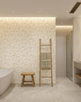 Dew & Gold elegant gold botanical leaf wallpaper creating ambiance in a serene bathroom