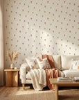 Ditsy Delight cream colorful tiny flower wallpaper in a warm and inviting living room