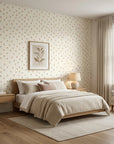 Ditsy Delight cream colorful tiny flower wallpaper adding character to a cozy bedroom