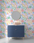 Modern rainbow-hued wireframe shapes on a white peel-and-stick background - Doodle Bloom