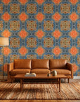 Drift & Scatter abstract blue and orange wallpaper in a warm and inviting living room
