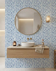 Drifting Petals blue abstract wallpaper creating ambiance in a serene bathroom