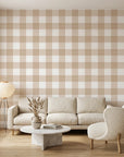Dune Plaid warm beige gingham check wallpaper in a warm and inviting living room