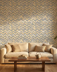 Dusk Passage grey and gold geometric wallpaper in a warm and inviting living room