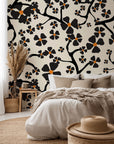 Contemporary cream-colored peel and stick wallpaper displaying a pattern of black floral branches