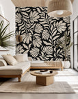 Self-adhesive wall covering in a black and cream floral silhouette design, 'Ebony Garden' pattern