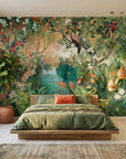Tropical Eden Revealed wallpaper with lush jungle foliage and exotic birds on bedroom accent wall