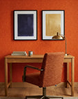 Electric Saffron vibrant red and yellow retro stripe wallpaper adding character to a cozy bedroom