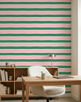 Ember Blush pink and green horizontal stripe wallpaper creating ambiance in a serene bathroom