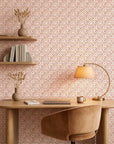 Ember Drift warm terracotta abstract wallpaper as a feature wall in a bright home office