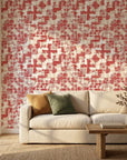 Ember & Linen textured red abstract wallpaper in a warm and inviting living room