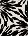 Cream and black shibori sunburst pattern on self-adhesive wallpaper