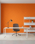 Ember Mosaic bold orange geometric wallpaper as a feature wall in a bright home office