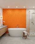 Ember Mosaic bold orange geometric wallpaper creating ambiance in a serene bathroom