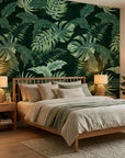 Emerald Jungle deep green tropical botanical wallpaper adding character to a cozy bedroom