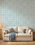 Emerald Lozenge cool geometric peel and stick wallpaper in a warm and inviting living room