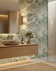 Emerald Whispers delicate leaf wallpaper creating ambiance in a serene bathroom