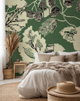 Self-adhesive, removable wall covering featuring a weathered, botanical floral pattern in cream and green tones—the Ethereal Grove design