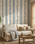 Ethereal Stripes blue and beige floral stripe wallpaper in a warm and inviting living room