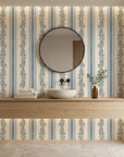 Ethereal Stripes blue and beige floral stripe wallpaper creating ambiance in a serene bathroom