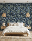 Evening Whisper navy blue vintage floral vine wallpaper adding character to a cozy bedroom