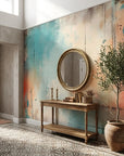 Faded Fresco teal and coral abstract wallpaper as a feature wall in a bright home office