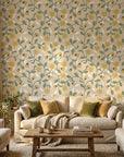 Field Gold yellow botanical peel and stick wallpaper in a warm and inviting living room