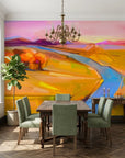 Field & Fire vibrant sunset landscape wallpaper in a warm and inviting living room