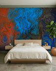 Fire & Current bold abstract fluid wallpaper in a warm and inviting living room