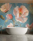 First Blush floral mural wallpaper with coral peonies on teal blue in modern bathroom setting