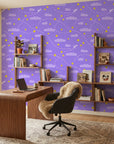 Flight Dreams purple paper airplane and star wallpaper as a feature wall in a bright home office