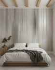 Flowing Silk silver champagne draped adding character to a cozy bedroom