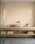 Fluid Grain abstract wood pattern wallpaper creating ambiance in a serene bathroom