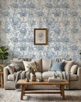 Blue and cream Fog Garden wallpaper with distressed damask pattern in modern living room setting