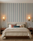 Fog & Stone neutral striped peel and stick wallpaper adding character to a cozy bedroom