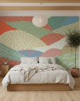 Folk art peel and stick wallpaper with patterned landscape bands