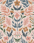 Stylized flowers, leaves, and berries form a soft folk-art pattern. The colors are subdued: muted pink, dusty blue, warm ochre, and sage green, set against a pale blush backdrop.