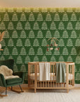 Forest Canopy removable wallpaper with cream fern motifs on forest green in modern nursery setting