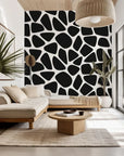 Self-adhesive black and white wallpaper featuring an abstract, irregular spot design (Fractured Night)
