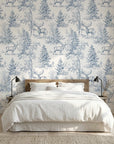 Frost & Fable serene blue woodland toile wallpaper adding character to a cozy bedroom