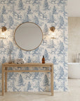 Frost & Fable serene blue woodland toile wallpaper creating ambiance in a serene bathroom