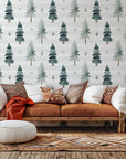Self-adhesive wallcovering featuring a striped watercolor design of verdant pine trees, titled Frosted Woods