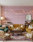Frosted Rose Hush blush pink rose wallpaper in a warm and inviting living room