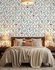 Multicolored floral Garden Trellis peel and stick wallpaper in modern bedroom with neutral bedding